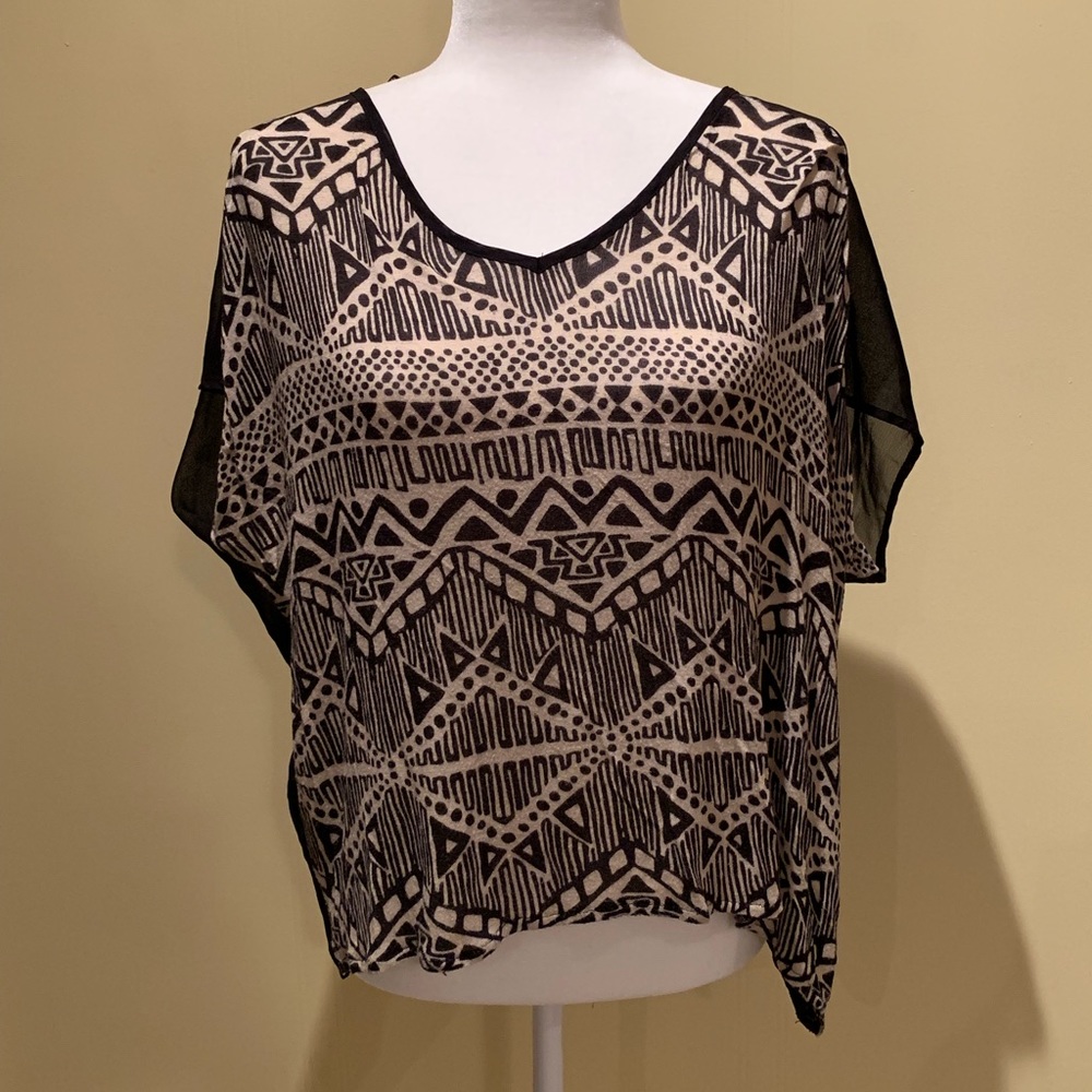 Patterned Shirt. See Through Back.